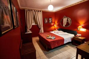 Postel nebo postele na pokoji v ubytování Exis Hotel
