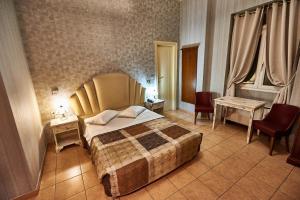 Postel nebo postele na pokoji v ubytování Exis Hotel