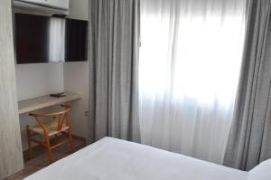 Sjónvarps- og/eða afþreyingartæki á Hotel Cinco Tierras