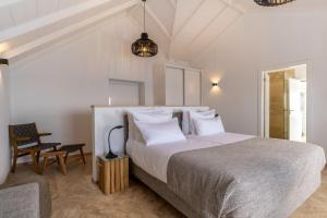 Postel nebo postele na pokoji v ubytování Escarpa - The Madeira Hideaway