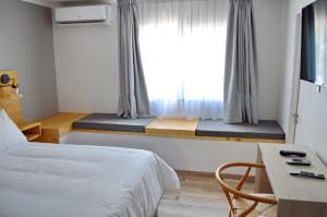 TV a/nebo společenská místnost v ubytování Hotel Cinco Tierras