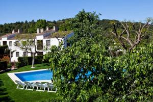 Bazén v ubytovaní Apartamentos Golf Place alebo v jeho blízkosti