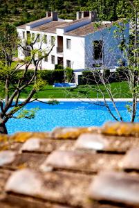 Bazén v ubytovaní Apartamentos Golf Place alebo v jeho blízkosti