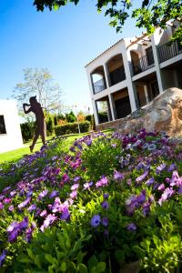 Vonkajšia záhrada v ubytovaní Apartamentos Golf Place