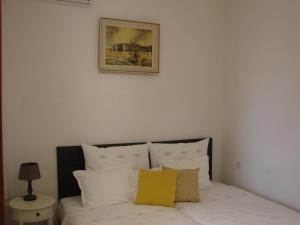 Postel nebo postele na pokoji v ubytování Rooms Monika