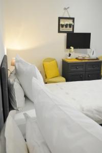 Postel nebo postele na pokoji v ubytování Rooms Monika
