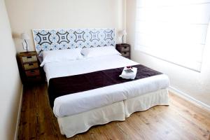 Posteľ alebo postele v izbe v ubytovaní Apartamentos Golf Place