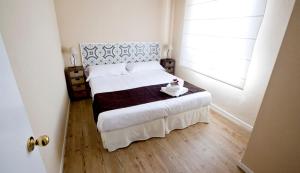 Posteľ alebo postele v izbe v ubytovaní Apartamentos Golf Place