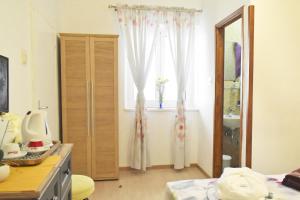 TV a/nebo společenská místnost v ubytování Rooms Monika