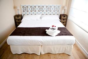 Posteľ alebo postele v izbe v ubytovaní Apartamentos Golf Place