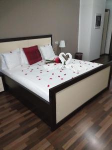 Postel nebo postele na pokoji v ubytování Hotel Corona