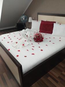 Postel nebo postele na pokoji v ubytování Hotel Corona
