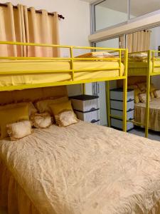 Bunk bed o mga bunk bed sa kuwarto sa Higuey Center City