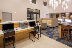 a living room filled with furniture and a coffee table at Holiday Inn Express & Suites Pahrump, an IHG Hotel in Pahrump