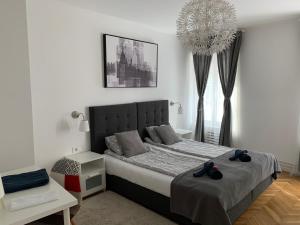 Postel nebo postele na pokoji v ubytování Apartmani SB 42