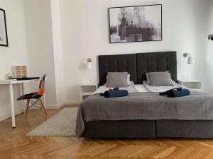 Postel nebo postele na pokoji v ubytování Apartmani SB 42