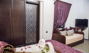 TV o dispositivi per l'intrattenimento presso Riad EL Manantial,Dar Hajjaj,Patrimonio del SXIX