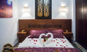Letto o letti in una camera di Riad EL Manantial,Dar Hajjaj,Patrimonio del SXIX