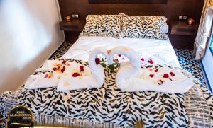 Letto o letti in una camera di Riad EL Manantial,Dar Hajjaj,Patrimonio del SXIX