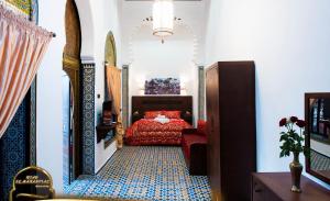 Letto o letti in una camera di Riad EL Manantial,Dar Hajjaj,Patrimonio del SXIX
