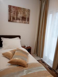 Postel nebo postele na pokoji v ubytování " Villa Kruna Lux "
