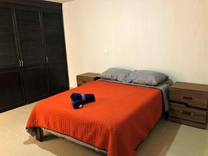 Postel nebo postele na pokoji v ubytování Hotel Morelia In