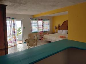 Istumisnurk majutusasutuses Orrie's Beach Bar and Hotel