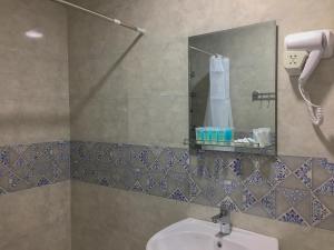 Ένα μπάνιο στο Guest House Maradona