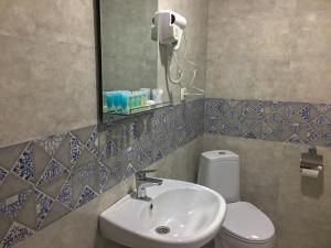 Ένα μπάνιο στο Guest House Maradona