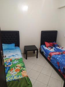 Ένα ή περισσότερα κρεβάτια σε δωμάτιο στο residence l Océon de bouznika +6 φωτογραφίες