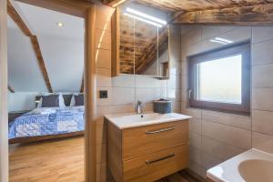 Postel nebo postele na pokoji v ubytování House Kaja