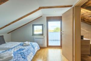 Postel nebo postele na pokoji v ubytování House Kaja