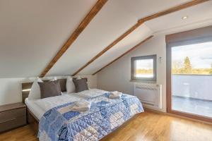 Postel nebo postele na pokoji v ubytování House Kaja