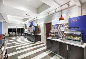 a view of a store with a food counter at Holiday Inn Express Hotel and Suites Shreveport South Park Plaza by IHG in Shreveport