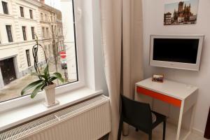 TV a/nebo společenská místnost v ubytování B&B Allegra Nova