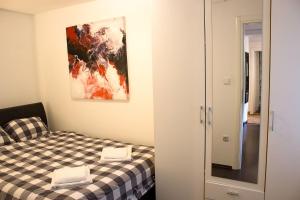 Posteľ alebo postele v izbe v ubytovaní Zagreb Creative Apartments APP 2