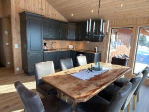 Kuchyň nebo kuchyňský kout v ubytování Løstegård Cabins