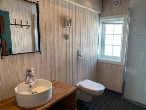 Koupelna v ubytování Løstegård Cabins + 37 fotografií