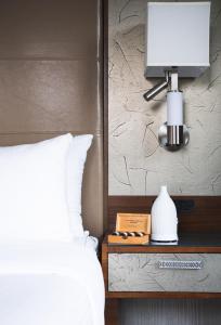 Katil atau katil-katil dalam bilik di Hotel BLU