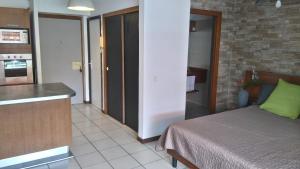 Katil atau katil-katil dalam bilik di Orio Papeete centre apt w pool