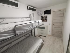 Posteľ alebo postele v izbe v ubytovaní APARTAMENTO GALTOR 6