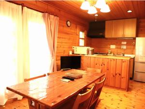 
A kitchen or kitchenette at Holiday Cottage Green Valley Hakuba
