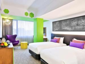 Katil atau katil-katil dalam bilik di Hotel Stadium