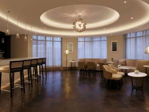 TV a/nebo společenská místnost v ubytování Novotel Lucknow Gomti Nagar