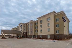 a rendering of a hotel with a parking lot at Candlewood Suites Del City, an IHG Hotel in Del City