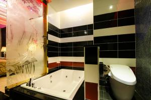 Koupelna v ubytování Zheng Yi Classic Hotel & Motel