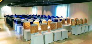 a row of chairs lined up in a room at Annex Suites Bogra - CityCentre in Bogra