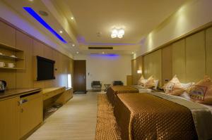 TV a/nebo společenská místnost v ubytování Zheng Yi Classic Hotel & Motel