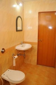 Koupelna v ubytování Palolem Guest House + 37 fotografií