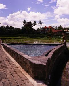 Swimmingpoolen hos eller tæt på Kidem Ubud Villas